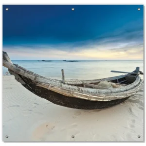 Zertifiziert Lichtschutzbild Fischerboot am Strand mit Sonnenuntergang