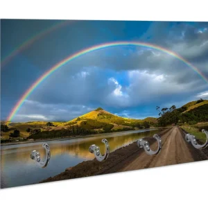 Billig Schlüsselbrett Regenbogen über Hügel